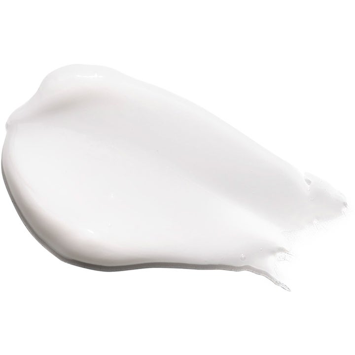 Exuviance Daily Eye Smoother 15 g silottava silmänympärysvoide, jossa on pehmeä valkoinen voidekoostumus.