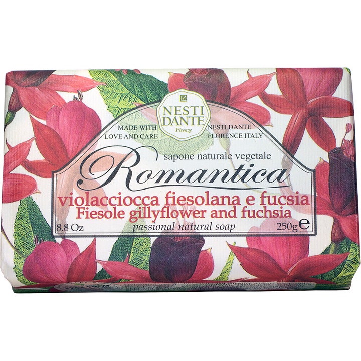 Nesti Dante Romantica 250 g puhdistava palasaippua kukkakuvioidussa kääreessä, jossa on punaisia kukkia.