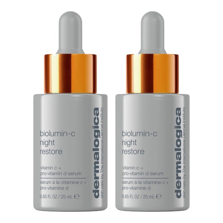 Dermalogica BioLumin-C Night Restore 25 ml kaksi kirkastavaa yöseerumia harmaissa pulloissa kuparinvärisin korkein.