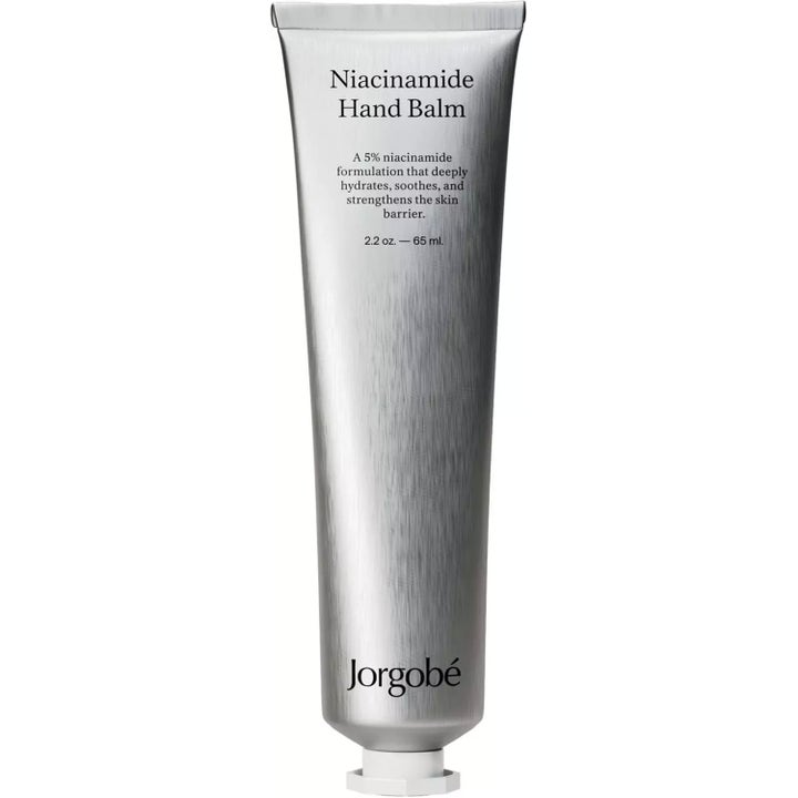 Jorgobé Niacinamide Hand Balm 65 ml ihoa vahvistava ja kosteuttava käsivoide hopeisessa metallituubissa.
