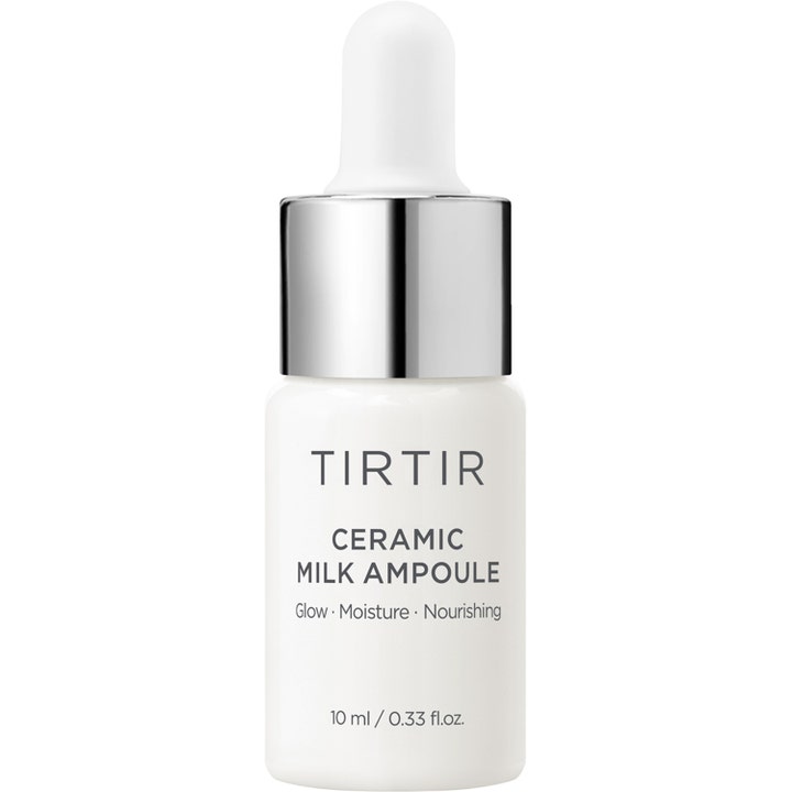 TIRTIR Ceramic Milk Ampoule 10 ml kosteuttava ja heleyttävä seerumi valkoisessa pullossa hopeisella korkilla.
