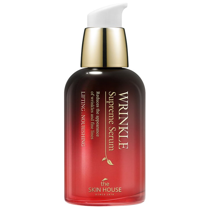 The Skin House Wrinkle Supreme Serum 50 ml silottava anti-age seerumi punamustassa pullossa kultaisella kauluksella.