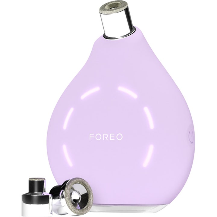 FOREO KIWI™ Derma 1 kpl ihohuokosia puhdistava laite vaaleanvioletilla rungolla ja metallisilla vaihtopäillä.
