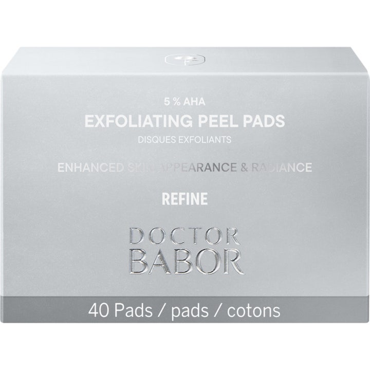 Babor DOC Exfoliating Peel Pads 40 kpl kirkastava kuorintalappu on pyöreä ja valkoinen kuvioidulla pinnalla.