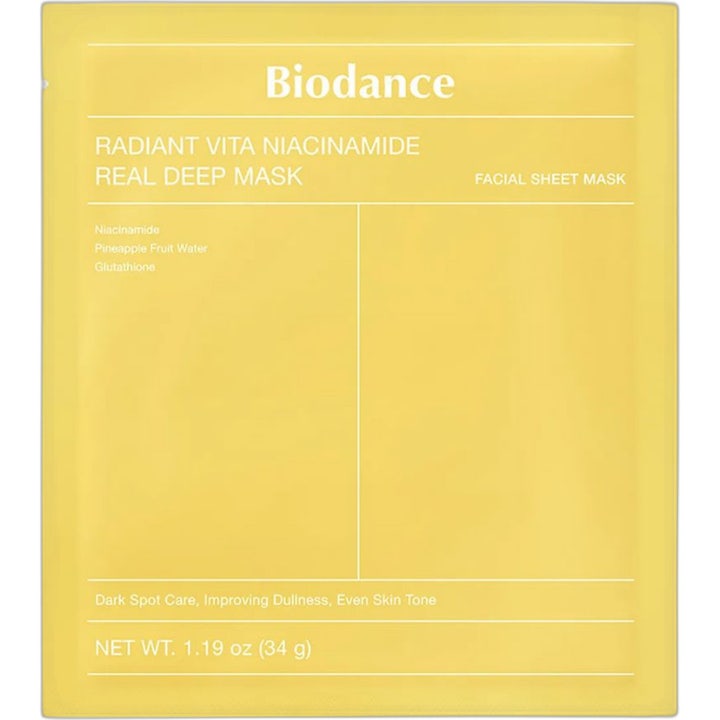 Biodance Radiant Vita Niacinamide Real Deep Mask 1 kpl kirkastava kasvonaamio keltaisessa pussissa ja valkoinen geelinaamio.