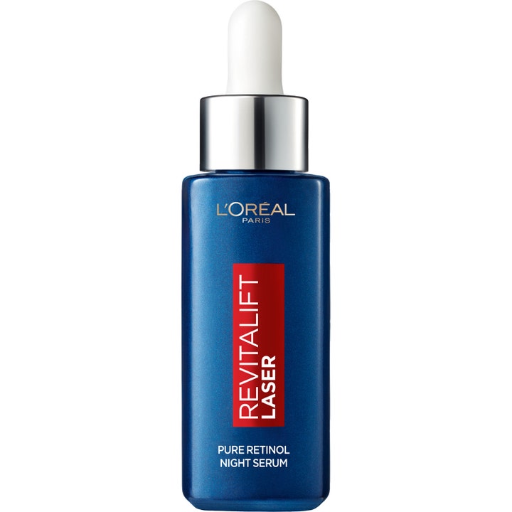 L'Oréal Paris Revitalift Laser 30 ml silottava yöseerumi tummansinisessä lasipullossa hopeisella pipetillä.