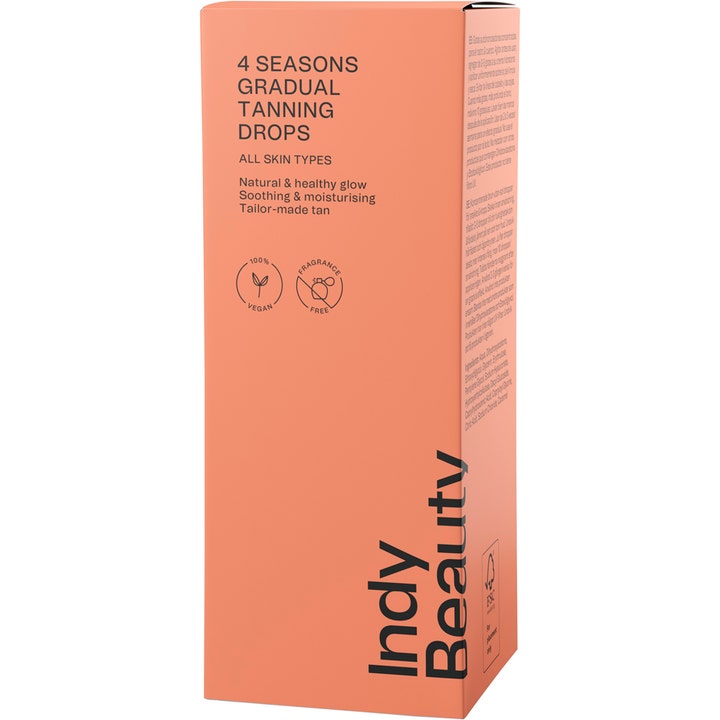 Indy Beauty Gradual Tan Drops 30 ml antaa luonnollisen hehkun, persikanvärinen pakkaus vegaanimerkinnällä.