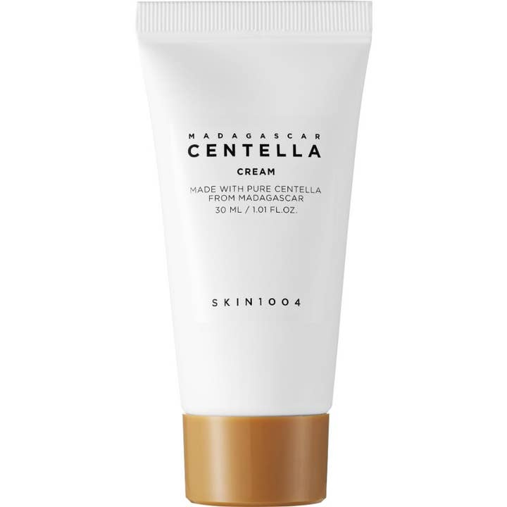 SKIN1004 Madagascar Centella Cream 30 ml rauhoittava kasvovoide valkoisessa tuubissa, jossa on kullanruskea korkki.