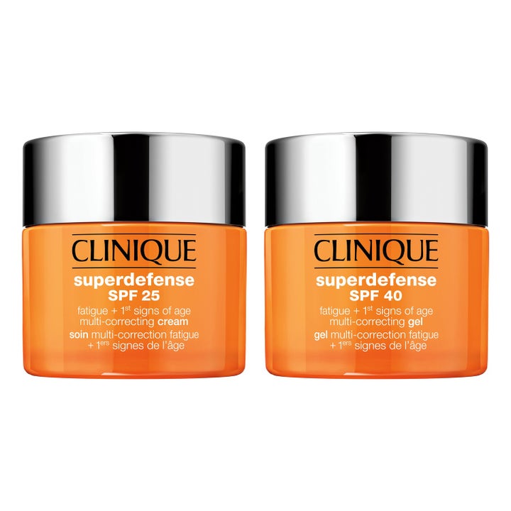 Clinique Superdefense SPF 25 ja SPF 40 väsymystä vähentävä voide ja geeli oransseissa purkeissa hopeisin kansin.