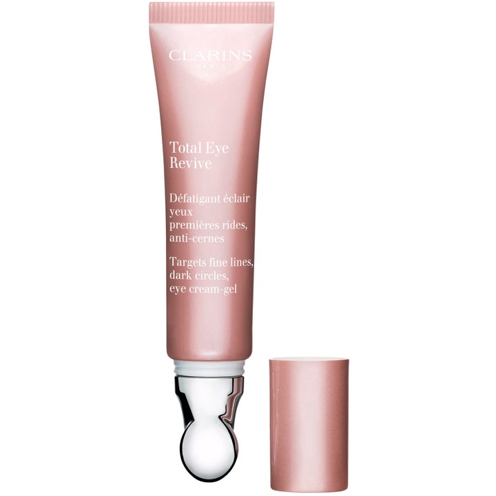 Clarins Total Eye Revive 15 ml silmänympärysvoide häivyttää juonteita vaaleanpunaisessa metallikärkisessä tuubissa.