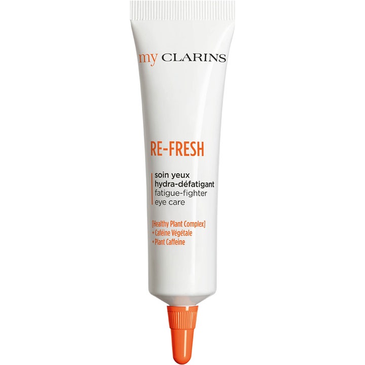 My Clarins RE-FRESH 15 ml virkistävä silmänympärysvoide väsymystä vastaan valkoisessa tuubissa oranssilla korkilla