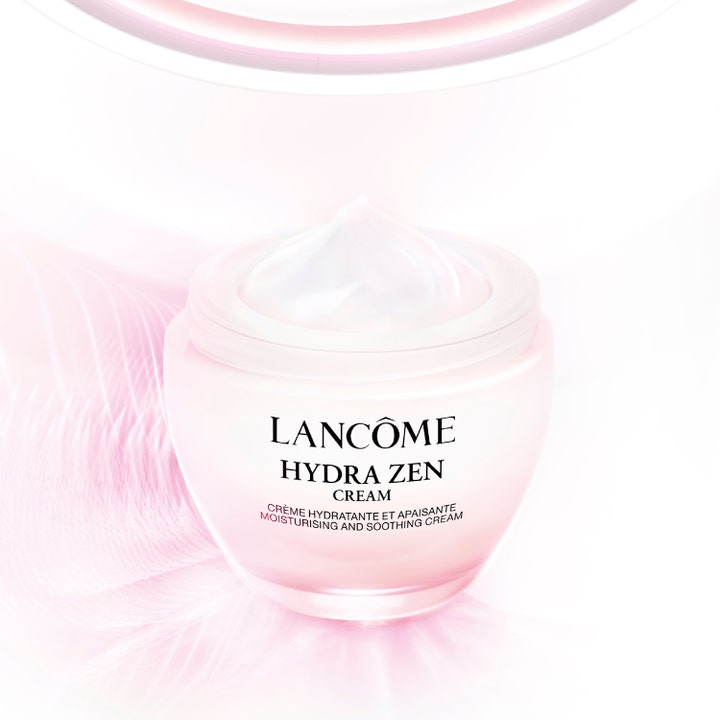 Lancôme Hydra Zen 50 ml rauhoittava kasvovoide vaaleanpunaisessa lasipurkissa, jossa on täyteläinen valkoinen koostumus.