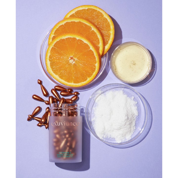 Exuviance Vitamin C Serum Capsules 60 kpl kirkastava seerumi pronssisissa kapseleissa appelsiiniviipaleiden kera