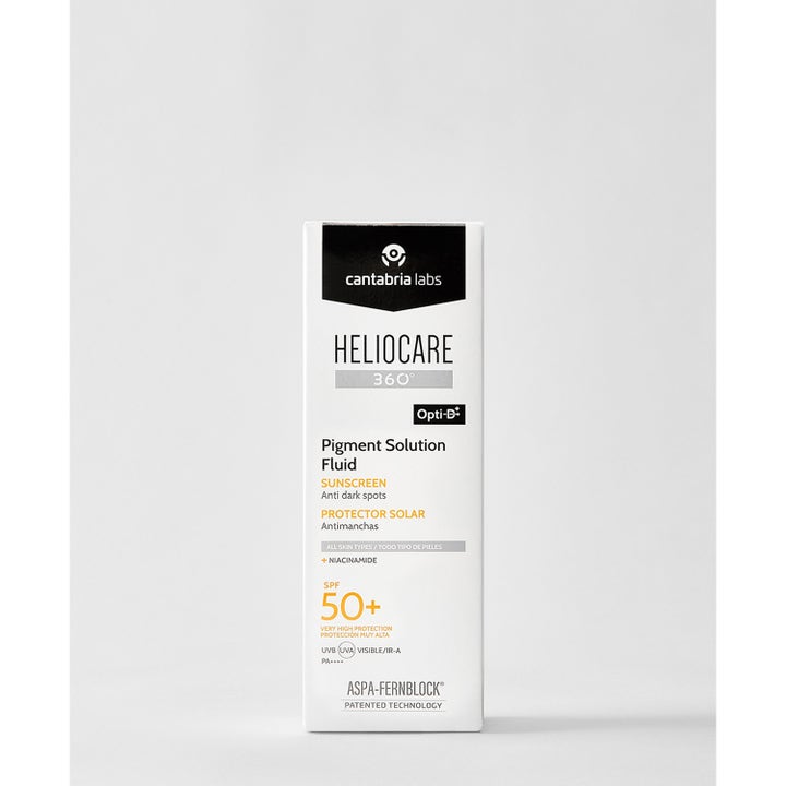 Heliocare Pigment Solution Fluid 50 ml pigmenttiläiskiä ehkäisevä aurinkovoide valkoisessa pahvipakkauksessa SPF 50+
