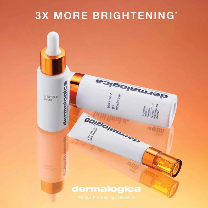 Dermalogica BioLumin-C Eye Serum Duo kirkastava C-vitamiinisetti valkoisissa pakkauksissa oranssilla taustalla.