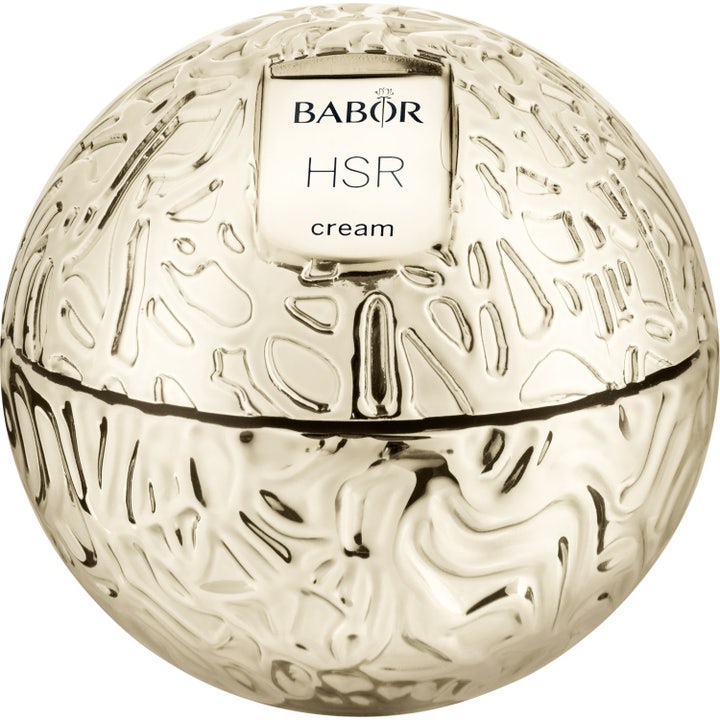 Babor HSR Lifting Cream kiinteyttävä kasvovoide ylellisessä kultaisessa ja kohokuvioidussa pallonmuotoisessa purkissa.