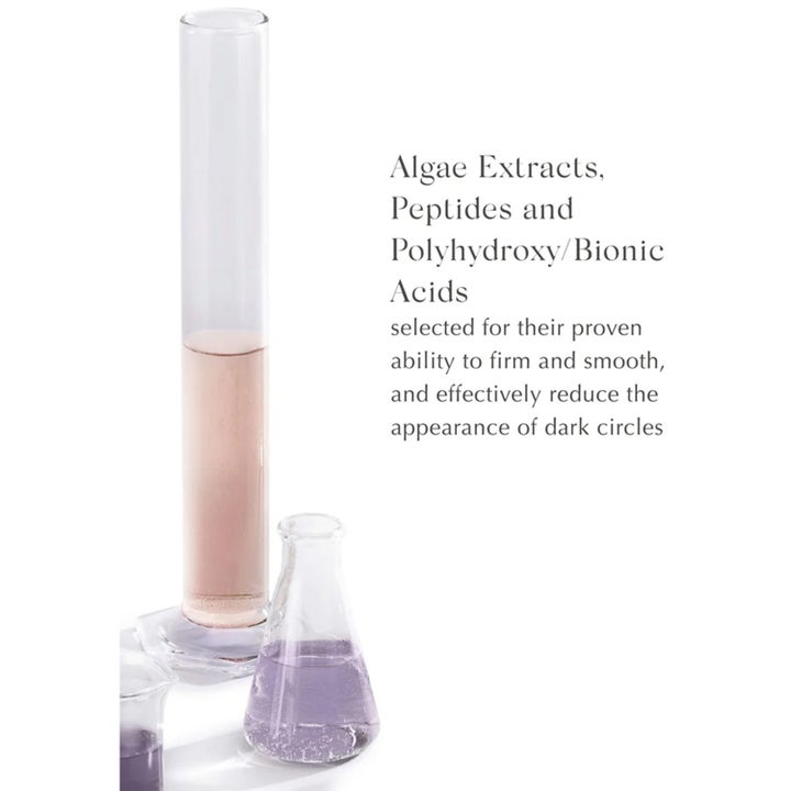 Exuviance Bright Eyes Dark Circle Corrector 15 g silmänympärysvoide ja laboratoriolaseja sekä tekstiä leväuutteesta.