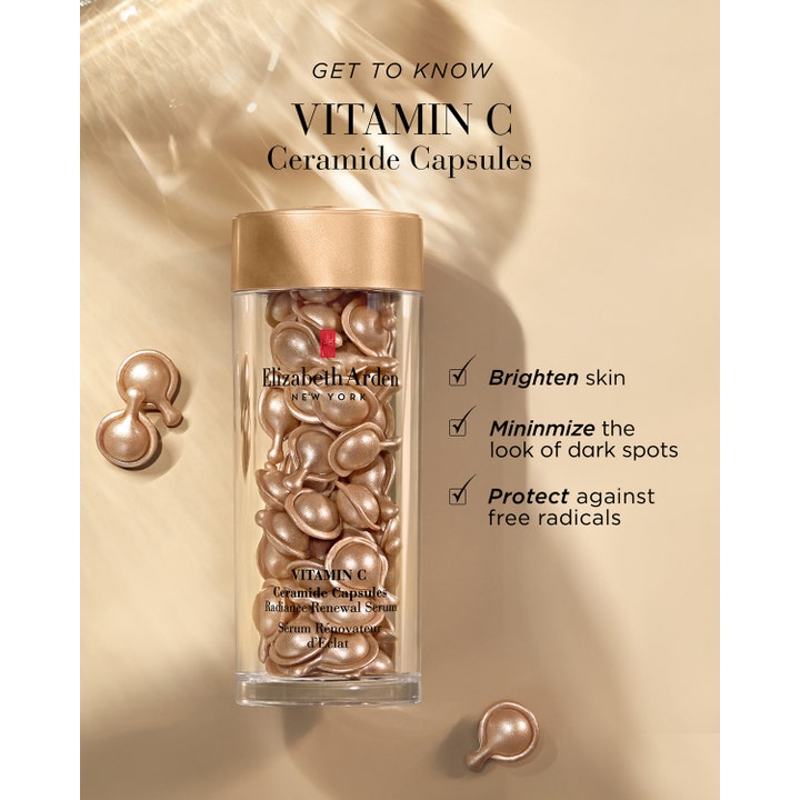 Elizabeth Arden Ceramide Capsules Vitamin C 30 kpl kirkastava seerumi kultaisissa kapseleissa vähentää tummia läiskiä.