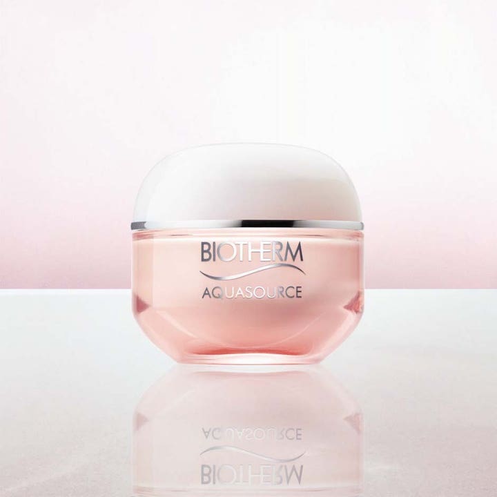 Biotherm Aquasource Cica Nutri 30 ml kosteuttava kasvovoide vaaleanpunaisessa lasipurkissa valkoisella korkilla.