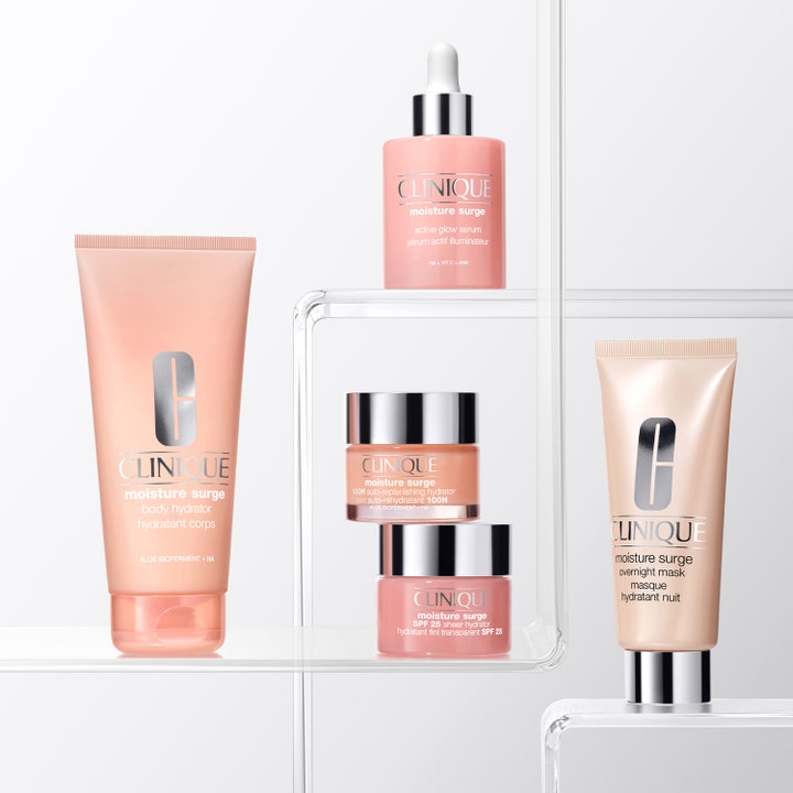 Clinique Moisture Surge Body Hydrator 200 ml kosteuttava vartalovoide vaaleanpunaisessa tuubissa kirkkailla hyllyillä