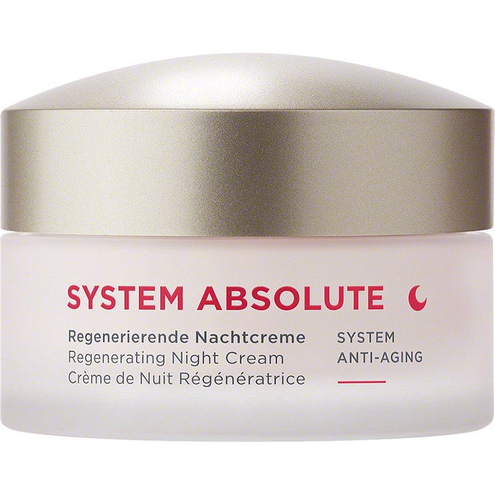 Annemarie Börlind System Absolute uudistava anti-aging yövoide huurretussa lasipurkissa, jossa on kultainen kansi.