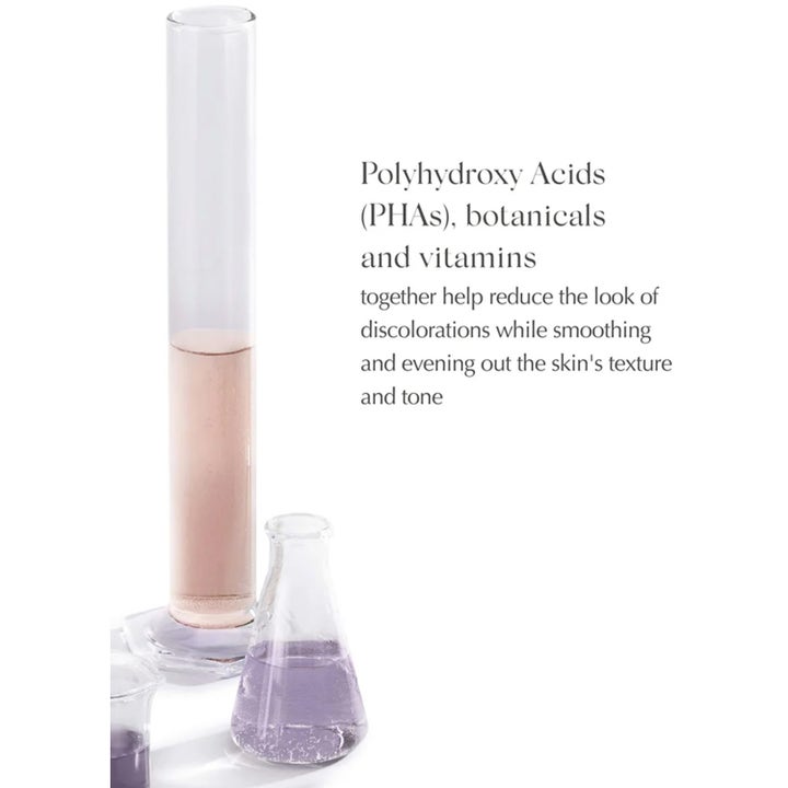Exuviance Daily Eye Smoother 15 g silmänympärysvoide tasoittaa ihoa PHA-hapoilla. Kuvassa laboratoriolaseja ja tekstiä.