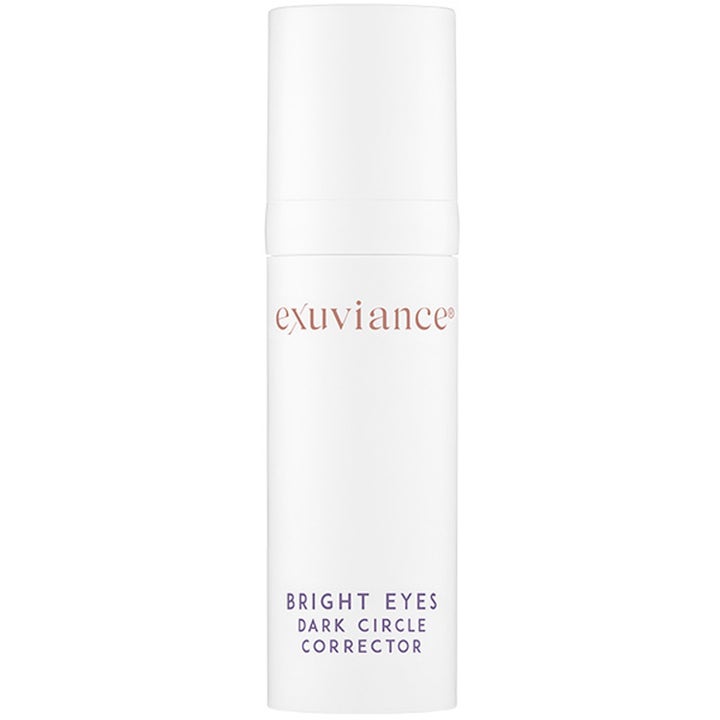 Exuviance Bright Eyes Dark Circle Corrector 15 ml silmänympärysvoide kirkastaa katsetta valkoisessa pumppupullossa.