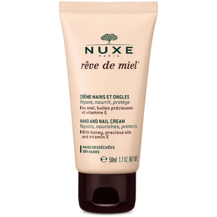 Nuxe Rêve de Miel 50 ml ravitseva käsivoide ja kynsivoide persikanvärisessä tuubissa tummanruskealla korkilla.