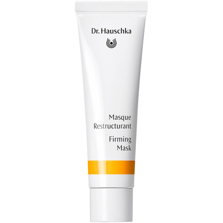 Dr. Hauschka Firming Mask kiinteyttävä kasvonaamio valkoisessa tuubissa jossa on oranssi raita ja valkoinen korkki.