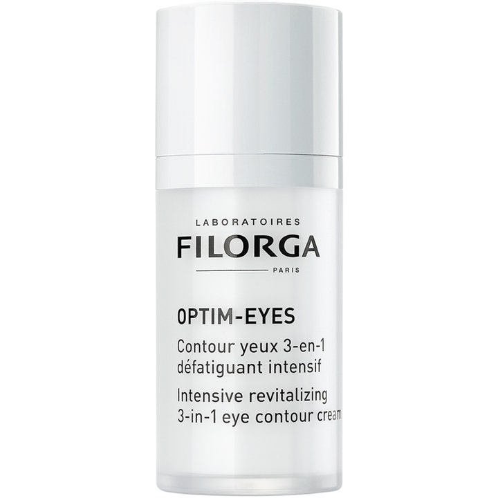Filorga Optim-Eyes 15 ml virkistävä silmänympärysvoide kirkastaa ihoa valkoisessa sylinterinmuotoisessa pumppupullossa.