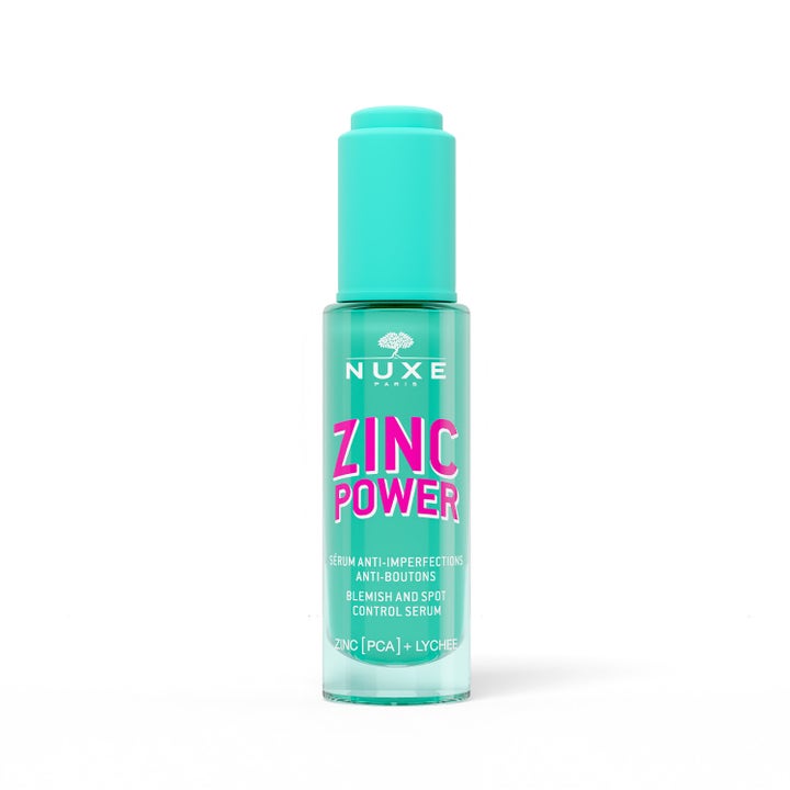 Nuxe Zinc Power Blemish and Spot Control Serum epäpuhtauksia vähentävä seerumi turkoosissa pullossa pinkillä tekstillä