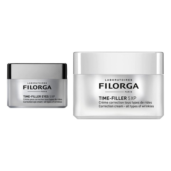 Filorga Time-Filler 5XP ja Eyes 5XP ryppyjä silottava kasvovoide ja silmänympärysvoide hopeisissa purkeissa.