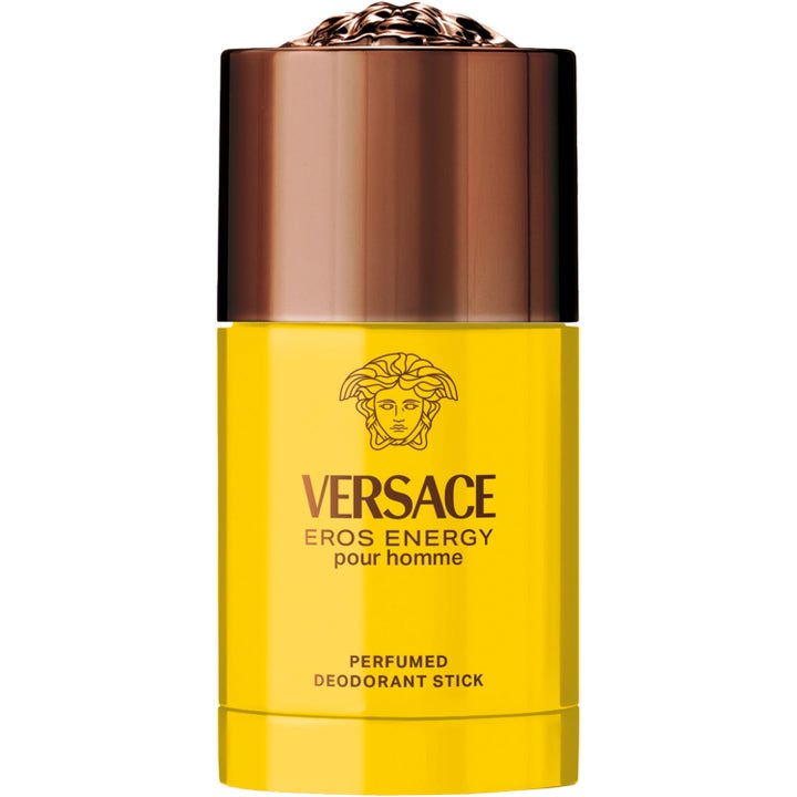 Versace Eros Energy Pour Homme hajustettu deodoranttipuikko kirkkaankeltaisessa pakkauksessa ja pronssisella korkilla