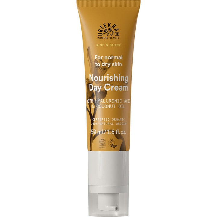 Urtekram Rise & Shine 50 ml ravitseva päivävoide hyaluronihapolla keltaisessa tuubissa valkoisella korkilla.