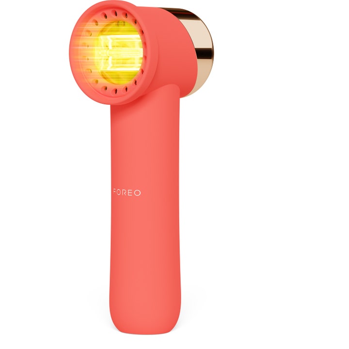 Foreo FAQ 201 korallinvärinen LED-kasvolaite silmänympäryksille kirkastaa ihoa keltaisella valolla.