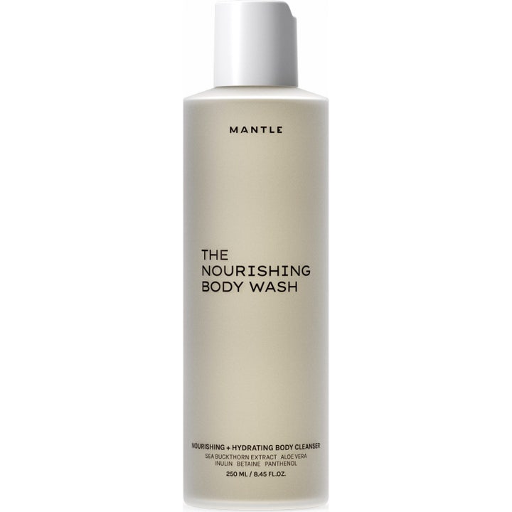 Mantle The Nourishing Body Wash 250 ml ravitseva suihkugeeli tyylikkäässä vaaleassa muovipullossa valkoisella korkilla.