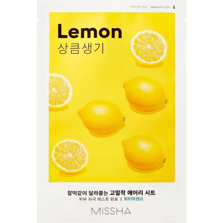 Missha Airy Fit Sheet Mask Lemon 19 g kirkastava kangasnaamio, valkoinen pussi keltaisella sitruunakuvituksella.