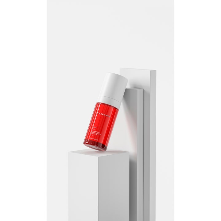 Niche Beauty Lab Theramid Azid 30 ml 15 % atselaiinihapposeerumi punaisessa läpinäkyvässä pullossa valkoisilla jalustoilla