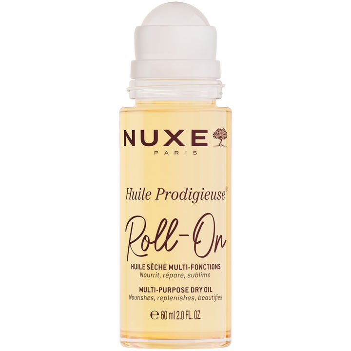 Nuxe Huile Prodigieuse Roll-On 60 ml ravitseva monikäyttöinen kuivaöljy kirkkaassa pullossa, jossa on valkoinen levityspää.