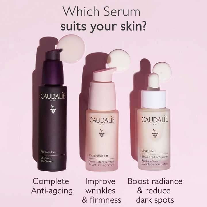 Caudalie Premier Cru The Serum 30 ml anti-age-seerumi tummassa pullossa muiden seerumien rinnalla.