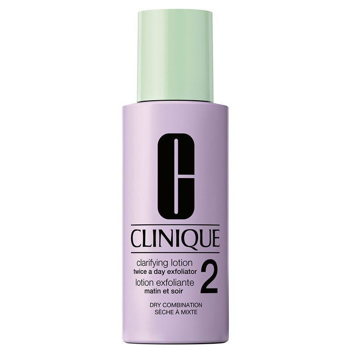 Clinique Clarifying Lotion 2 200 ml kirkastava kasvovesi lilahtavassa pullossa, jossa on vihreä korkki.