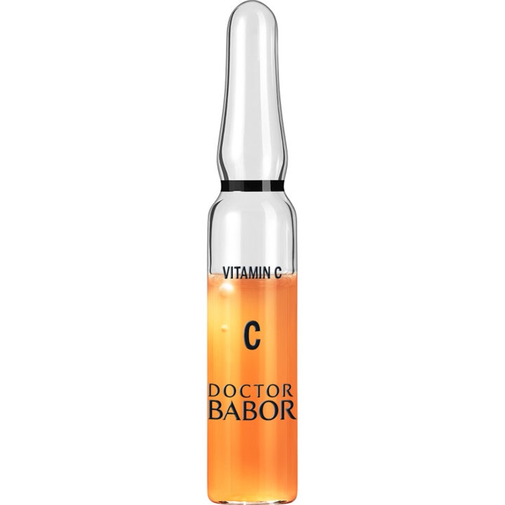 Doctor Babor Vitamin C kirkastava ampulli seerumi sisältää oranssia nestettä kirkkaassa lasiampullissa.