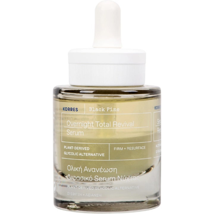 Korres Black Pine Overnight Total Revival Serum 30 ml silottava yöseerumi kirkkaassa lasipullossa valkoisella pipetillä.