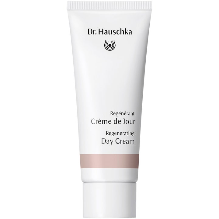 Dr. Hauschka Regenerating Day Cream silottava ja uudistava päivävoide valkoisessa tuubissa beigellä raidalla
