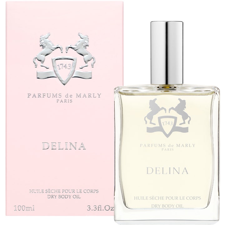 Parfums de Marly Delina Body Oil 100 ml pehmentävä kuivaöljy kirkkaassa lasipullossa ja vaaleanpunaisessa pakkauksessa