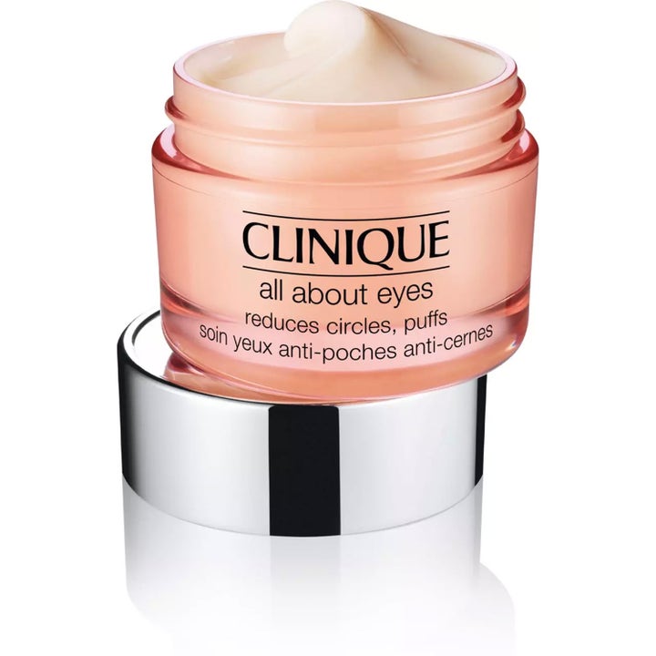 Clinique All About Eyes Cream 30 ml silmänympärysvoide vähentää turvotusta vaaleanpunaisessa purkissa hopeakannella.
