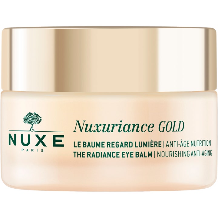 Nuxe Nuxuriance Gold The Radiance Eye Balm ravitseva anti-age-silmänympärysvoide persikkaisessa purkissa kultakorkilla.