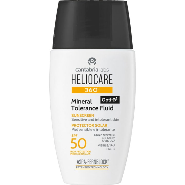 Heliocare 360° Mineral Tolerance Fluid 50 ml aurinkovoide suojaa herkkää ihoa valkoisessa mustakorkkisessa pullossa.