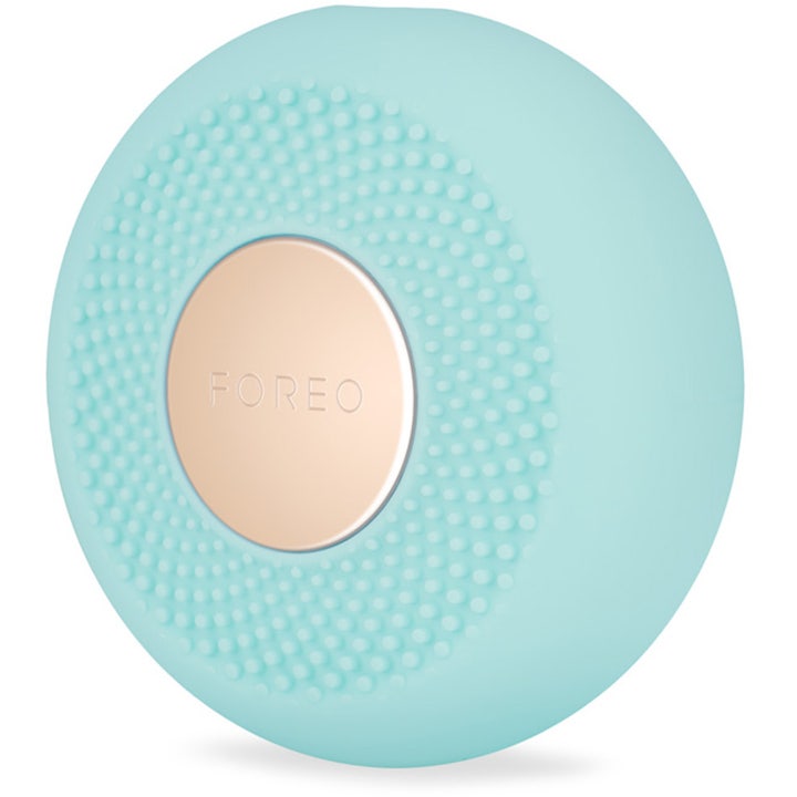 FOREO UFO mini 2 Mint ihonhoitolaite kasvohoitoon on mintunvihreä nystyräpintainen laite kultaisella keskiöllä
