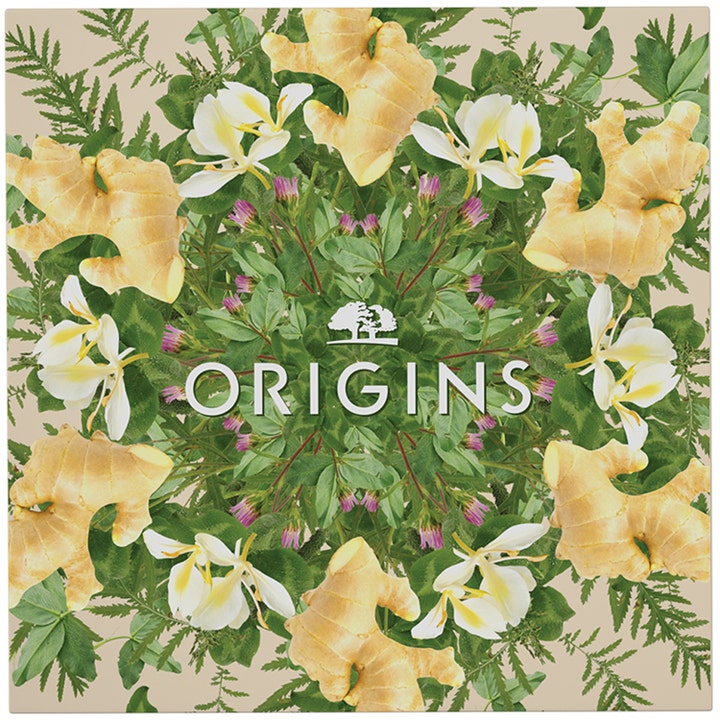 Origins The Glow-Boosting Collection 70 ml ihonhoitosetti inkivääriä ja kukkia sisältävässä pakkauksessa.